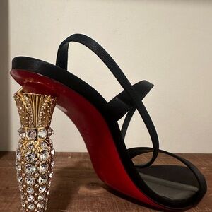 Christian Louboutin Black and Gold Heels